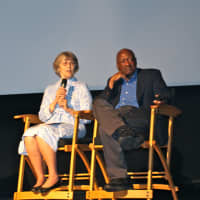 <p>Two speakers, Nancy Scheffler and Dr. John R. Howard, respond to student questions.</p>