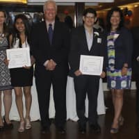 <p>Latino U honorees pose with Michael Kaplowitz, who presented them with a certificate of merit. </p>
