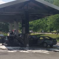 <p>The scene after the fire was extinguished at the chain reaction crash at the Mobil station in Harrison on Tuesday.</p>
