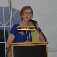 <p>Anne Sweazey makes acceptance remarks from the podium.</p>