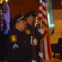 <p>The Yonkers police Honor Guard presents the colors at the Westchester Youth Police Academy graduation on Wednesday, June 4.</p>