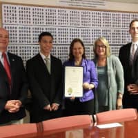 <p>Wilton High senior Chase Smith is congratulated on his Connecticut Secretary of the State 12th Grade Excellence in Citizenship Award.</p>