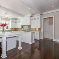 <p>White, light and bright, the kitchen at 6 Winker Lane in Westport is one of the rooms that makes the house a special appeal to potential buyers.</p>