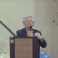 <p>Sandy Galef addresses the audience at Walk In My Shoes in Peekskill. </p>