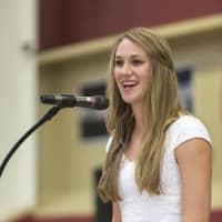 <p>Valedictorian Lillian Brouwer addresses the audience and gives her class advice. </p>