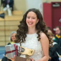 <p>Emily Silk of Greenwich is presented with five major awards at the commencement exercises at the Harvey School. </p>