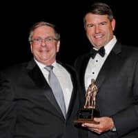 <p>Stuart Marwell, CEO of Curtis Instruments, accepts the 2014 Humanitarian Award from R. Todd Rockefeller, Boys &amp; Girls Club of Northern Westchester board president.</p>