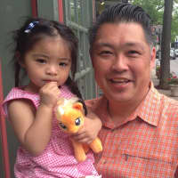 <p>Rangers fan Eric Moy and his daughter were out on Purchase Street on Tuesday. </p>