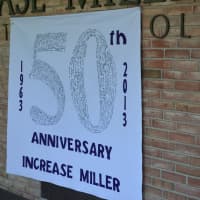 <p>A 50th anniversary banner was unveiled in front of Increase Miller Elementary School.</p>