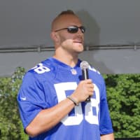 <p>Giants linebacker Mark Herzlich receives the MMRF Courage and Commitment Award.</p>