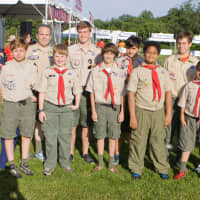 <p>New Canaan Boy Scouts of America Troop 31 volunteer on the course at water stations.</p>