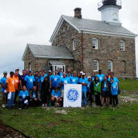 <p>Volunteers from GE Capital Real Estate complete a construction project at Sheffield Island off the coast of Norwalk. </p>