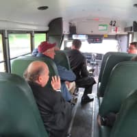 <p>The Scarsdale Board of Trustees on its annual bus tour of the village.</p>