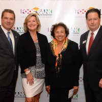 <p>From left, Yonkers Mayor Mike Spano; Food Bank for Westchester Executive Director Ellen Lynch; U.S. Rep. Nita Lowey, and Rick Rakow, Food Bank for Westchester Board Chair</p>