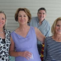 <p>Candace Adams, left, the CEO of Berkshire Hathaway HomeServices New England Properties, meets, from left, Darien Manager Liz Bacon, Jim Goldcamp and AnnMarie Wheeler.</p>