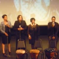 <p>Friends of McNair&#x27;s sing a gospel melody. </p>