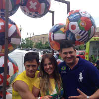 <p>From left, Niomar Silva, of Greenwich, Camilla Prado, of Stamford, and Rochester Sousa, of Stamford, watch the World Cup in Port Chester. </p>