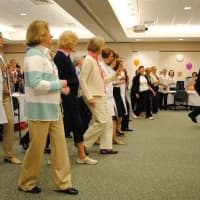 <p>Instructors from the Arthur Murray Dance Studio joined the celebration and offered dance lessons to survivors and staff.</p>