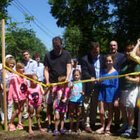 <p>Andt Todd&#x27;s daughters cut the ribbon on the link between Lyndhurst and Gracemere Park. </p>