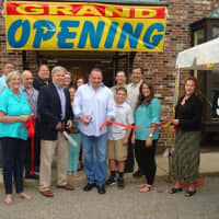 <p>Westwood Flooring &amp; Design Center employees celebrate the business&#x27; grand opening in Wilton.</p>