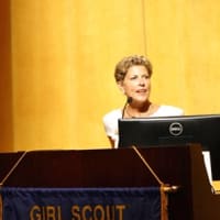<p>Linda Houston addresses the Girl Scouts of Connecticut who earned their Gold Awards in a ceremony June 1 at the University of New Haven.  </p>