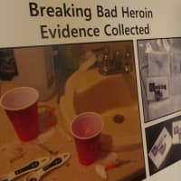 <p>Photographs of the heroin bags labeled &quot;Breaking Bad&quot; and other evidence collected. </p>