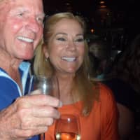 <p>Frank Gifford and his wife Kathie Lee</p>