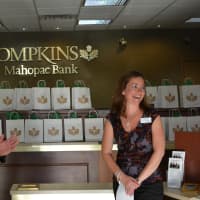<p>Kevin Kane, left, and Kim Arco, right, at Tompkins Mahopac Bank&#x27;s 10th anniversary celebration for the Mount Kisco branch.</p>