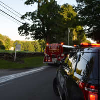 <p>A Ridgefield Fire Department tanker is driven down Route 123 in Lewisboro.</p>