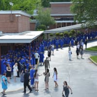 <p>Members of Horace Greeley High School&#x27;s Class of 2014 line up for graduation.</p>