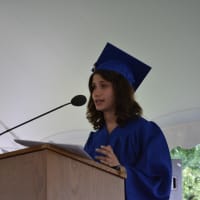 <p>Katherine Rosenberg, co-salutatorian, speaks at Horace Greeley High School&#x27;s 2014 graduation.</p>