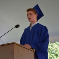 <p>Student Council President Andrew Lafortezza speaks at Horace Greeley High School&#x27;s 2014 graduation.</p>