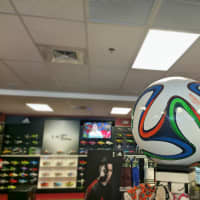 <p>A giant replica of the official World Cup Brazil 2014 soccer ball is on display at the Soccer and Rugby Imports store in Fairfield.</p>