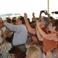 <p>Spectators have their cameras up for Somers High School&#x27;s 2014 graduation.</p>