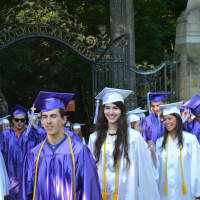 <p>Members of John Jay High School&#x27;s 2014 senior class line up for their commencement.</p>