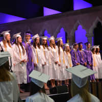 <p>Members of John Jay High School&#x27;s 2014 class take the stage for their commencement.</p>