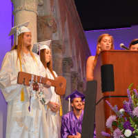 <p>Members of John Jay High School&#x27;s Class of 2014 handed over the Key of Knowledge to their 2015 counterparts.</p>