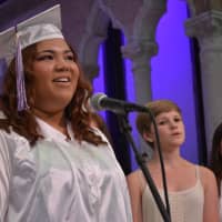 <p>Members of The Noteables perform at John Jay High School&#x27;s 2014 commencement.</p>