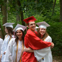 <p>Fox Lane High School graduates pose for a photo prior to their commencement.</p>