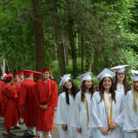 <p>Members of Fox Lane High School&#x27;s 2014 class line up for their commencement.</p>