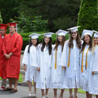 <p>Members of Fox Lane High School&#x27;s Class of 2014 line up for their commencement.</p>