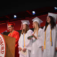 <p>Members of Fox Lane High School&#x27;s Class of 2014 presented gifts at their commencement.</p>