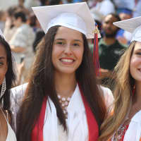 <p>Pamely Gomez, Kristella Morina and Jacqueline Firsty graduated from Yonkers Middle High School on June 25.</p>