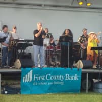 <p>Tim Currie&#x27;s Motown Band play a collection of oldies favorites during the first concert in a series this summer at Norwalk&#x27;s Calf Pasture Beach.</p>