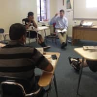 <p>Instructors in St. Joseph Parenting Center&#x27;s DAD program talk to fathers of young children.</p>