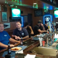 <p>Fan watch the U.S. and Germany play at Clarke&#x27;s Bar &amp; Restaurant in Hastings Thursday, June 26.</p>