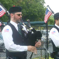 <p>Bagpipers play out the class of 2014.</p>