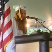 <p>Class President Katelyn Marcus speaks at the ceremony.</p>