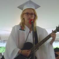 <p>Emma Iliou-Brad performs at graduation.</p>