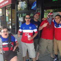 <p>John Herkert, left, of Rye Brook, Marc Padro, center, and Julian Valencia, right, are joined by out-of-state soccer fans. </p>